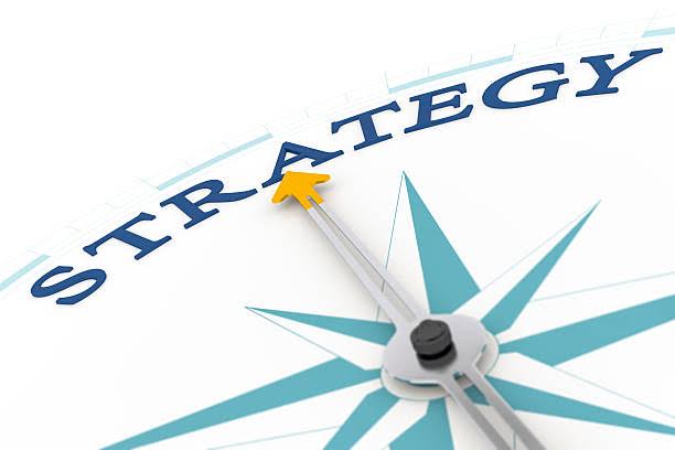 An image of a nice blue compass with the word strategy